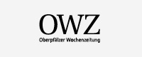Logo der Oberpfälzer Wochenzeitung – OWZ –, schwarze Schrift auf grauem Grund.