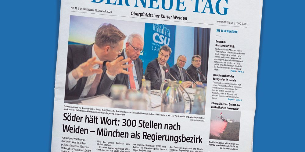 Titelseite einer Ausgabe der Zeitung „Der neue Tag“ von Oberpfalz Medien auf blauem Hintergrund.